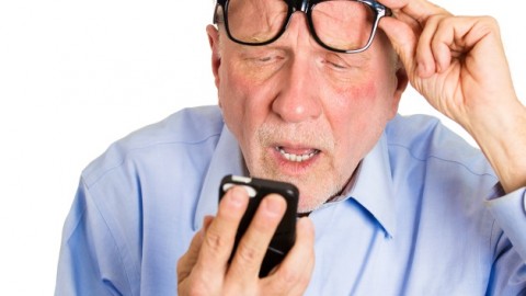 old_man_looking_at_smartphone