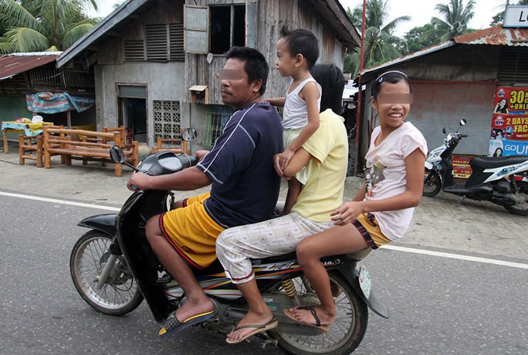 Motorcycle Child2 • Pres. Aquino Signs Law That Bans Children From Riding Motorcycles
