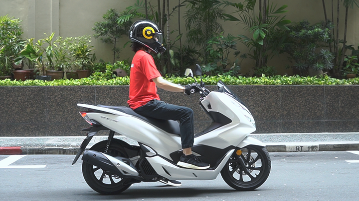 Honda PCX 150 Side View with Rider • 2019 Honda PCX 150 Review: Zero Compromises!