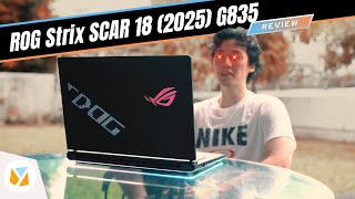 The ASUS ROG Strix SCAR 18 gaming laptop with RGB keyboard lighting.