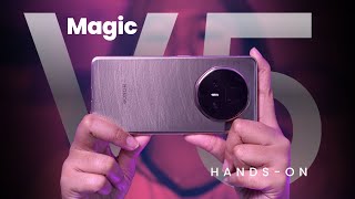 HONOR Magic V5 foldable phone held in hand, showcasing its sleek, closed design.