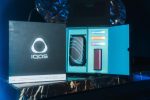 IQOS ILUMA i device on a dark background with glowing interface