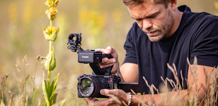 Canon EOS C50 full-frame cinema camera with attached XLR handle.