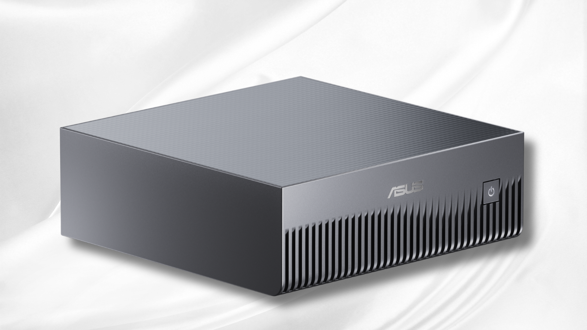 Compact ASUS Ascent GX10 desktop workstation with sleek black chassis