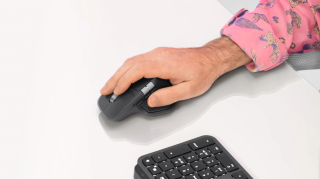 Logitech MX Master 4 wireless mouse on a desk